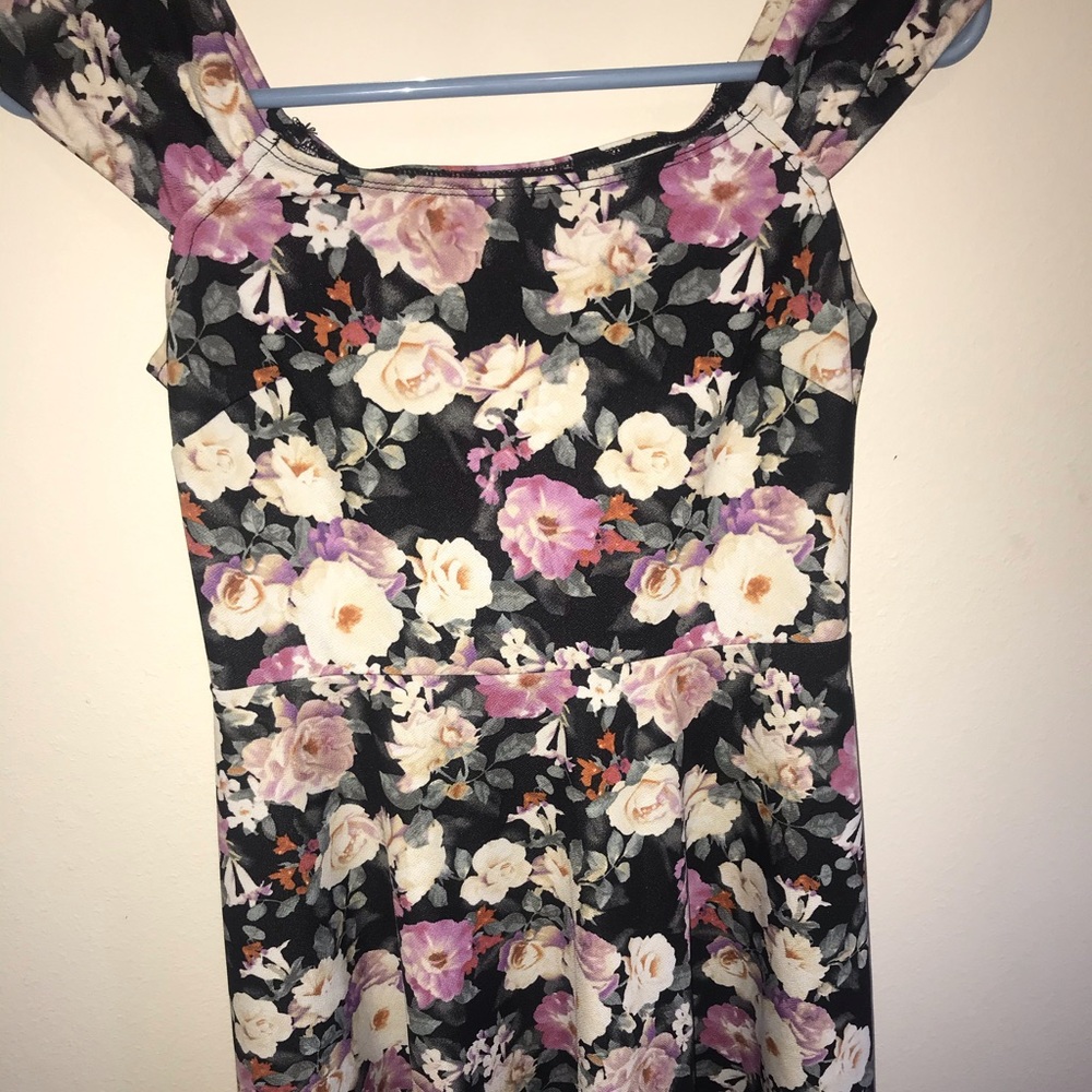 Floral form fitting dress.